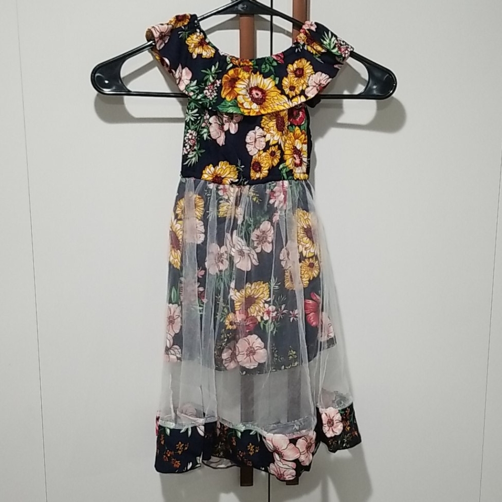 Beautiful little girls dress . Wildflowers